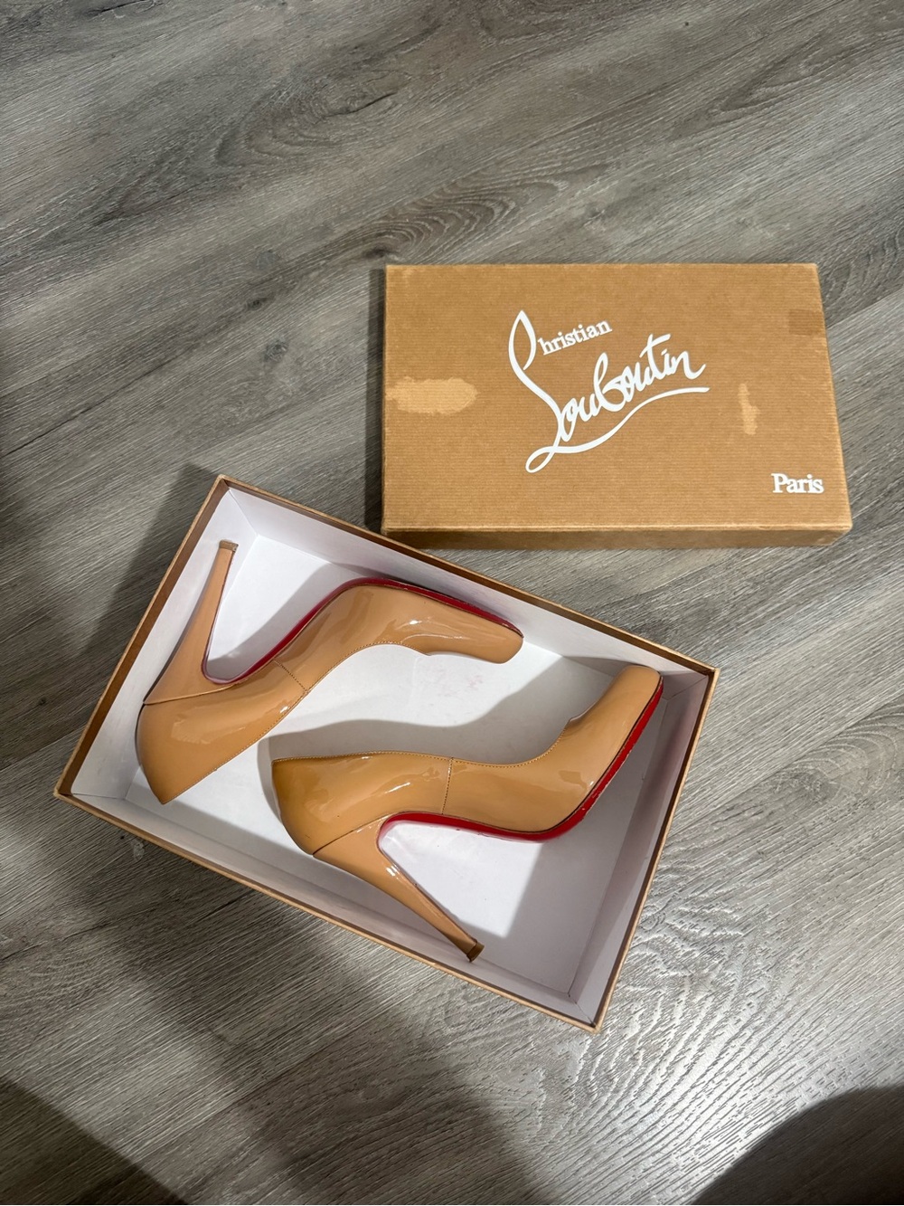 Nude Christian Louboutin heels